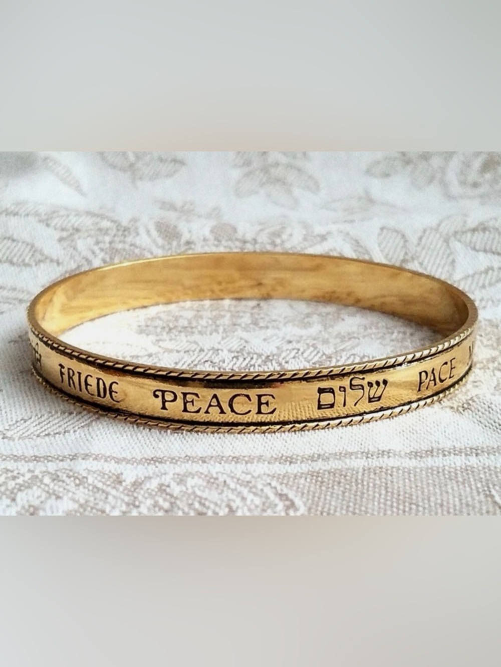 Vintage Avon Gold Peace Inscribed Bangle Bracelet